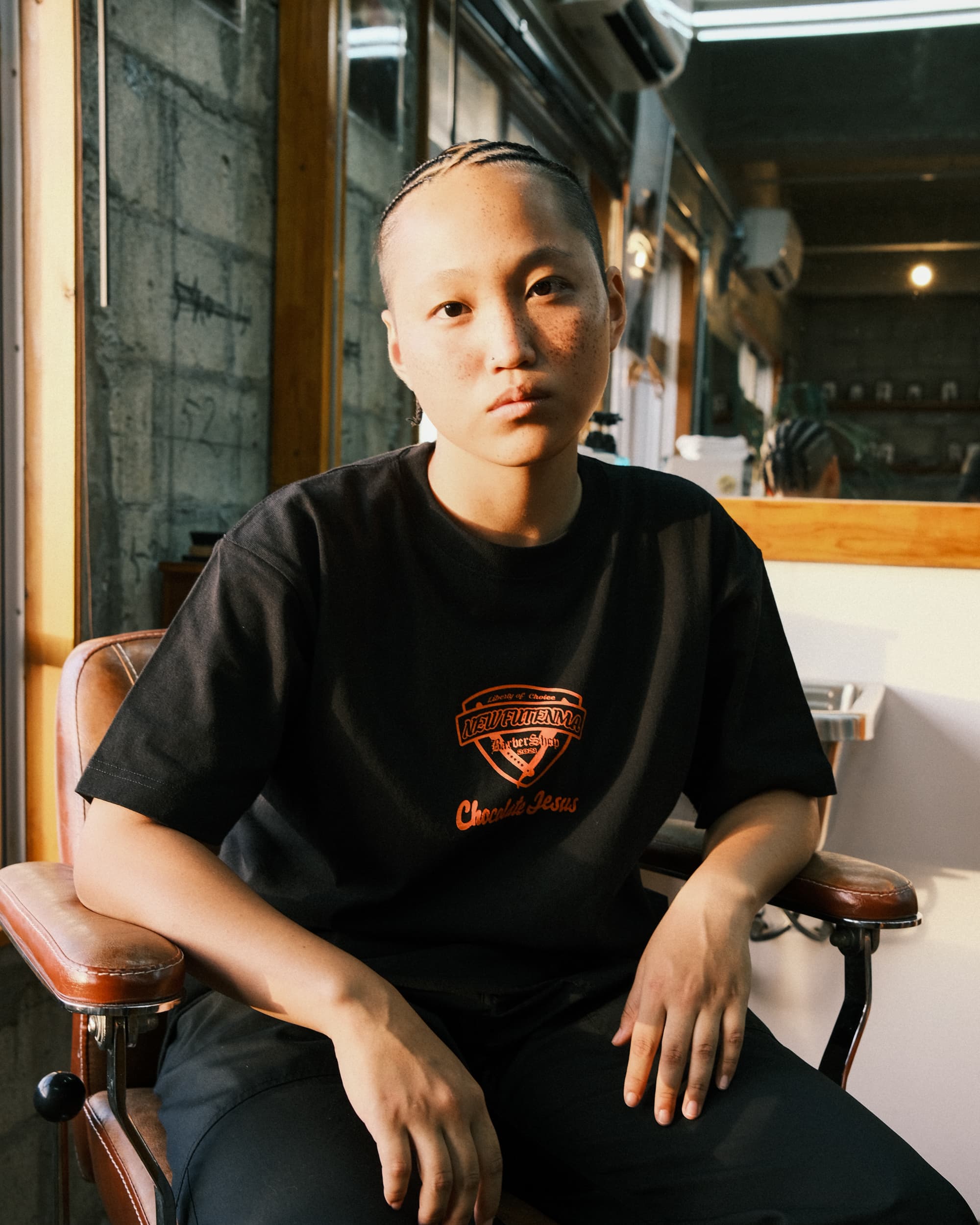 Customer portrait - cornrows, NFM tee